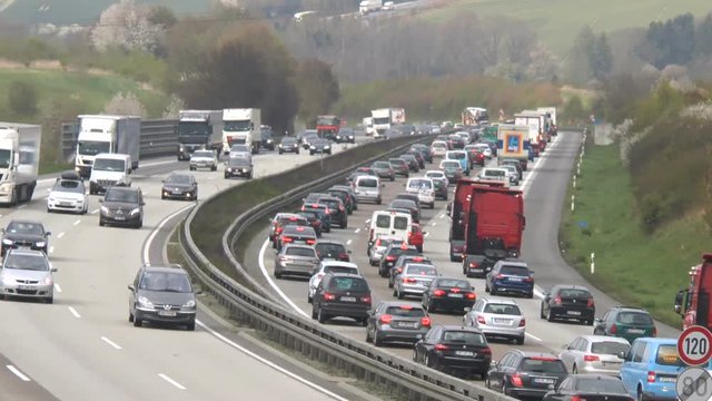 Dense traffic on German highway A3 between Idstein and Bad Camberg. A3 is a heavily frequented highway that connects Frankfurt with Cologne