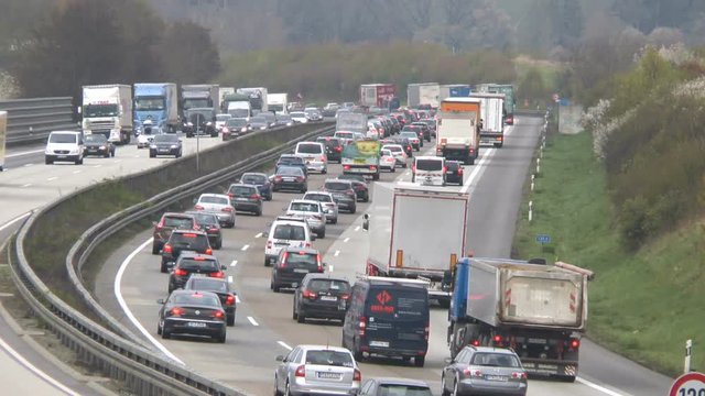 Dense traffic on German highway A3 between Idstein and Bad Camberg. A3 is a heavily frequented highway that connects Frankfurt with Cologne