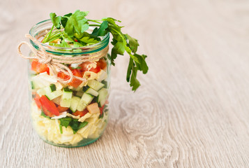 salad vegetables in a glass jar. healthy eating concept
