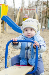 Fototapeta na wymiar Little boy at the playground