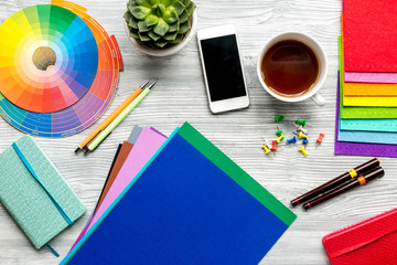 profession concept with designer tools on work desk background top view