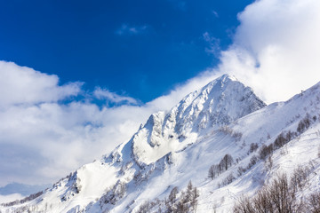 Fototapeta na wymiar Scenery top view on winter mountains