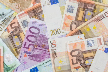 Many euro banknotes as background close up shot
