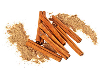 Cinnamon sticks and cinnamon powder, image on a white background