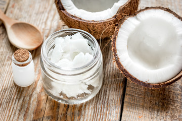 organic cosmetics concept with coconut on table background