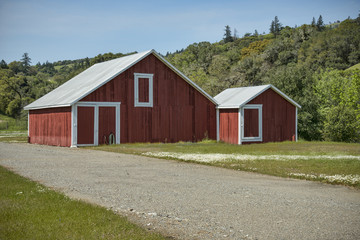 Fototapeta na wymiar Red barn white trim