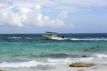 Big boat cruising on the shore. Dramatic sky in the background. Storm rising.