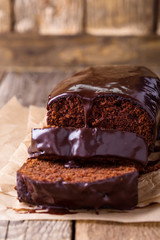 Homemade chocolate cake on wooden table