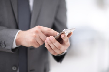 Mock up of a man holding device and touching screen