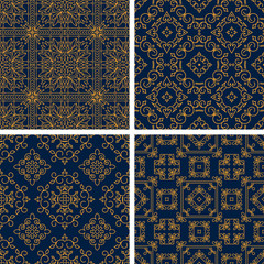 Set of four rich decorated calligraphic outlined stroke seamless patterns in dark and gold gamma.