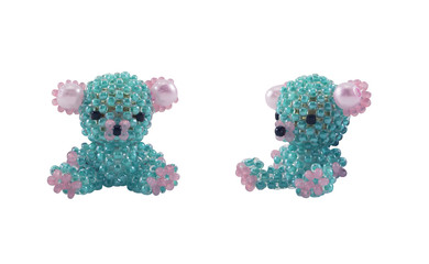 Isolated blue beaded bear toy front and angle view photo.