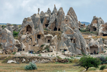 A geological formation consisting of volcanic tuff with cave dwelling. Cappadocia in Central Anatolia is a UNESCO World Heritage Site since 1985, Turkey - 143993545