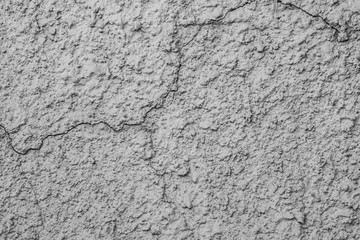 Fototapeta premium cracked plaster grey colour on the wall