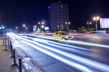 Night City Lights with Taxi in Bucharest