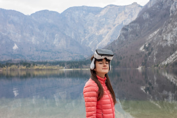 young woman in VR glasses