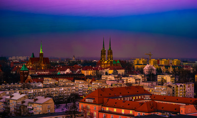 Panorama illuminated old town of Wroclaw at night. Popular travel destination in Poland. High dynamic range.