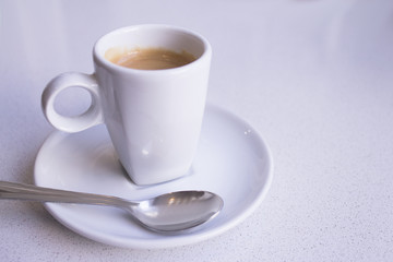 White mug of coffee