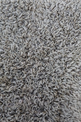 Wool background, closeup of a sheepskin