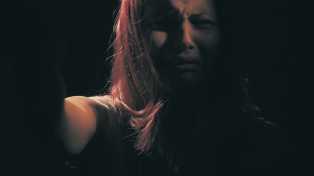 Unhappy sad teen girl. Domestic violence and abuse concept. 60 to 24fps UHD