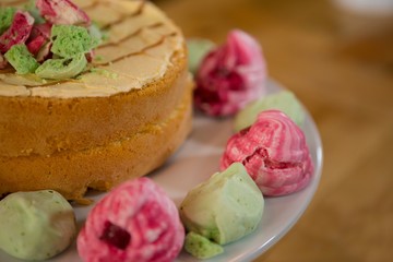 Delicious cake served on plate in coffee shop