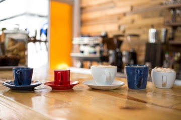 Coffee cups on table in cafeteria