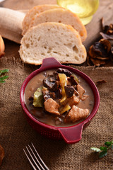 Stew with meat, mushrooms and vegetables