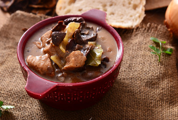 Stew with meat, mushrooms and vegetables