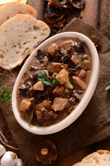 Stew with meat, mushrooms and vegetables