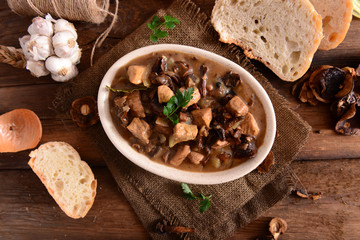 Stew with meat, mushrooms and vegetables