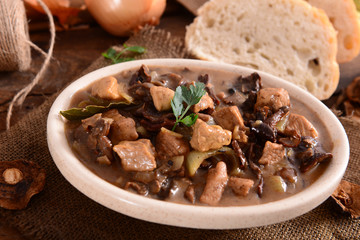 Stew with meat, mushrooms and vegetables