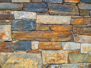 Colorful rock stone wall tile background