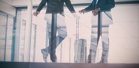 Businessman talking with colleague