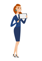 Smiling stewardess holding tablet computer.