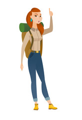 Traveler with open mouth pointing finger up.