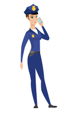 Policewoman talking on a mobile phone.