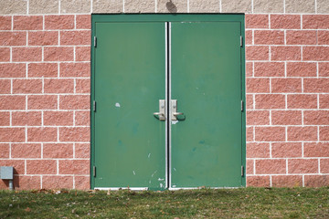 facade view of old door in industrial building