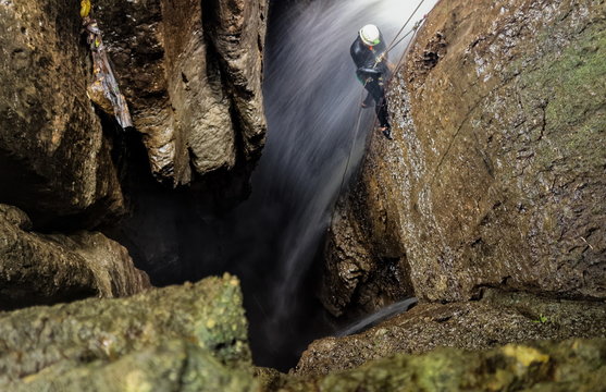 Experience the awe inspiring beauty of the deep waterfall entrance shaft at Mayei Cave in Ecuadorian Amazonia,with its captivating blurred motion.