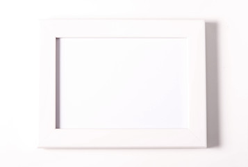 Fototapeta premium White picture frame isolated on white background