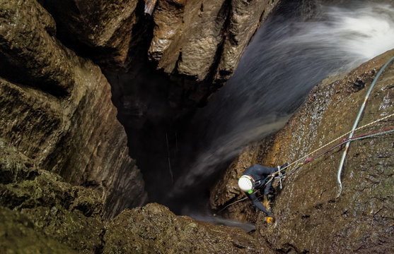 Experience the awe inspiring beauty of the deep waterfall entrance shaft at Mayei Cave in Ecuadorian Amazonia,with its captivating blurred motion.