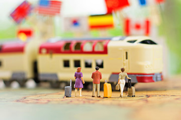 miniature people, travel by train for travel. using as business background concept.