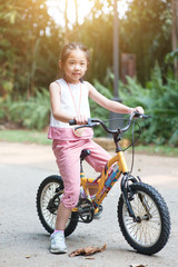 Fototapeta na wymiar Child cycling outdoor.