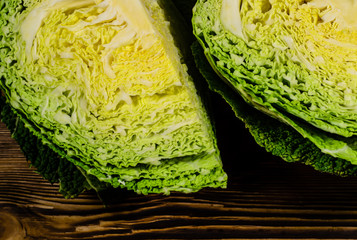 Obraz premium Savoy cabbage on wooden table
