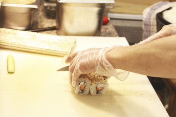 Itamae sushi chef preparing sushi