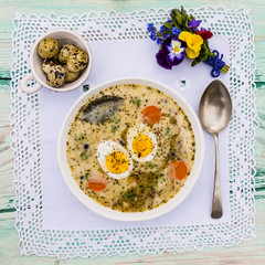 Traditional Easter rye sour soup with eggs, bacon and potatoes. 