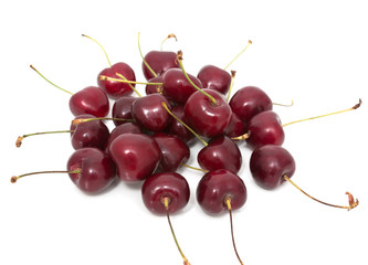 red cherries on a white background