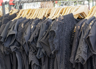 many black shirts for women hanging
