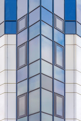 background texture. glass facade of a modern high-rise building