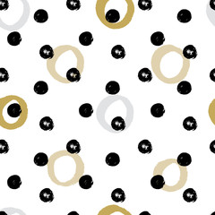 Seamless background with mustard color circles and ink texture.
