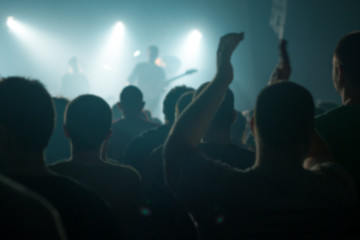 Fototapeta na wymiar Blur defocused music concert crowd as abstract background