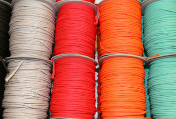 colored threads for sale in a haberdashery shop for hobbyists